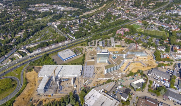 Aerial view, construction site and new construction ALDI-Nord Campus on the A40 motorway, Am Luftschacht in Essen-Kray in Essen, Ruhr area, North Rhine-Westphalia, Germany, construction work, construction area, building site, building plots, construction crane, construction project, construction site, DE, development, Essen, Europe, commercial enterprises, commercial area, commercial park, commercial site, commercial use, industrial site, capacity requirement, aerial view, aerial photography, aerial photography, new construction, overview, bird's-eye view, overview