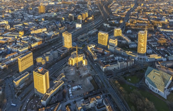 Aerial view, demolition Ypsilon-Haus of the RWE headquarters Essen in the Huyssenallee, planned new building for office campus, in the evening light in the southern district in Essen, Ruhr area, North Rhine-Westphalia, Germany, evening light, demolition work, construction work, construction area, construction site, building plots, building project, building site, office buildings, office complex, DE, energy company, Essen, Europe, commercial buildings, aerial view, aerial photography, aerial photography, overview, bird's eye view, Ypsilon-Haus, birds-eyes view, overview