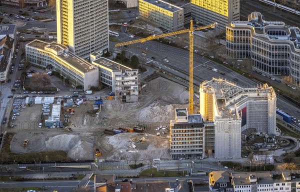 Aerial view, demolition Ypsilon-Haus of RWE headquarters Essen in Huyssenallee, planned new building for office campus, in the evening light in the southern district in Essen, Ruhr area, North Rhine-Westphalia, Germany, evening light, demolition work, construction work, construction area, construction site, building plots, construction measure, construction project, construction site, office complex, DE, energy company, Essen, Europe, aerial view, aerial photography, aerial photography, overview, bird's eye view, Ypsilon-Haus, birds-eyes view, overview