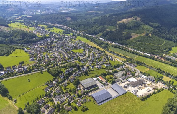 Aerial view, commercial area Bahnhofstraße at the edge of the forest on the Lenne and commercial area Therecker Weg, view of Rönkhausen, Finnentrop, Sauerland, North Rhine-Westphalia, Germany, DE, Europe, commercial enterprises, commercial area, commercial park, commercial location, commercial use, property tax, real estate, industrial area, industrial building, industrial site, aerial view, aerial photography, aerial photography, overview, bird's-eye view, forest area, residential area, residential area, residential buildings, residential quality, housing estate, birds-eyes view, overview