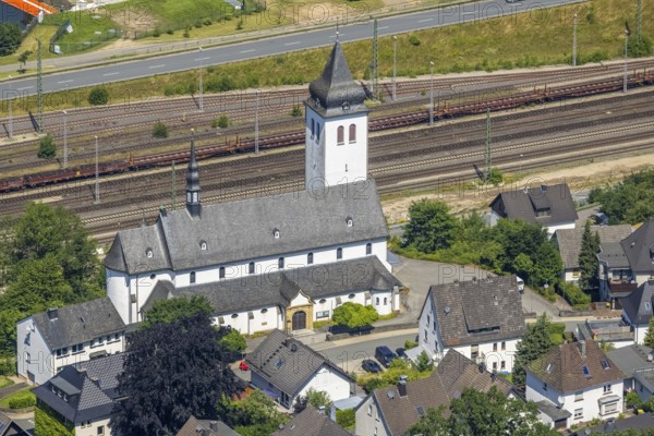Aerial view, Catholic parish church St. Johannes Nepomuk, Finnentrop, Sauerland, North Rhine-Westphalia, Germany, place of worship, railway tracks, DE, Europe, religious community, place of worship, church, parish, denomination, aerial view, aerial photography, aerial photography, overview, bird's-eye view, overview