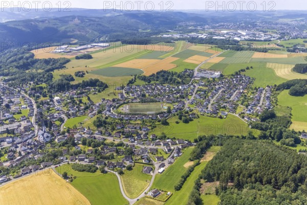 Aerial view, local view and sports field Heggen, Finnentrop, Sauerland, North Rhine-Westphalia, Germany, DE, Europe, football field, football stadium, property tax, real estate, aerial view, aerial photography, aerial photography, sports, sports facilities, sports field, sports facility, overview, bird's-eye view, meadows and fields, living and life, residential buildings, quality of life, birds-eyes view, overview