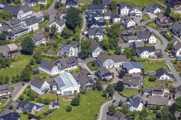 Aerial view, town centre with half-timbered houses in Schönholthausen, Finnentrop, Sauerland, North Rhine-Westphalia, Germany, DE, Europe, property tax, real estate, aerial view, aerial photography, aerial photography, overview, bird's-eye view, housing estate, housing and living, residential area, residential buildings, housing quality, housing estate, birds-eyes view, overview