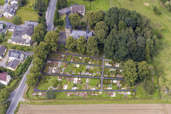 Aerial view, catholic church St. Agnes with cemetery in the district Bausenhagen, Fröndenberg/Ruhr, Ruhr area, North Rhine-Westphalia, Germany, place of worship, burial place, DE, Europe, cemetery, memorial, religious community, place of worship, house of God, graves, burial ground, holy place, church, parish, denomination, aerial view, aerial photography, aerial photography, religion, religious site, resting place, overview, bird's eye view, birds-eyes view, overview