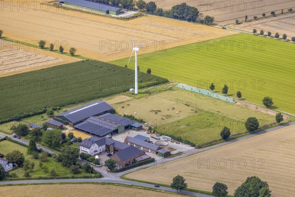 Aerial view, farm ratz rabatz with wind power plant in the district Ostbüren, Fröndenberg/Ruhr, Ruhr area, North Rhine-Westphalia, Germany, DE, Europe, family celebrations, aerial photography, aerial photography, aerial photography, horse farm, overview, event location, event venue, bird's eye view, WEA, wind energy, wind energy plant, wind power, wind turbine, wind turbines, birds-eyes view, overview