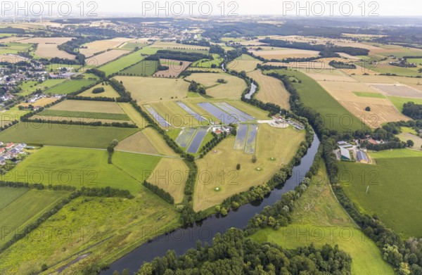 Aerial view, Hammer waterworks Warmen at the Merschstraße in the district Warmen, meadows and fields with river Ruhr meander with view to the run-of-river power plant Wickede and to Wickede, Fröndenberg/Ruhr, Ruhr area, North Rhine-Westphalia, Germany, DE, Europe, Hammer waterworks, aerial view, aerial photography, aerial photography, overview, bird's eye view, water treatment plant, water supply company, waterworks, birds-eyes view, overview, v