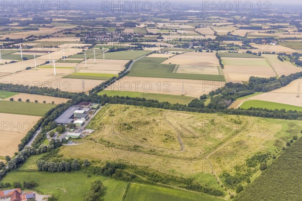 Aerial view, waste disposal company GWA Logistik in the district of Ostbüren, Fröndenberg/Ruhr, Ruhr area, North Rhine-Westphalia, Germany, waste management, DE, Europe, aerial view, aerial photography, aerial photography, overview, bird's-eye view, WEA, recycling centre, wind energy, wind energy plant, wind power, wind power plant, wind turbines, birds-eyes view, overview