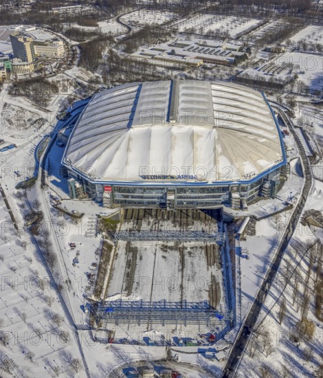 Aerial view, Schalke Veltins-Arena with closed roof and extension area for grass, Rudi-Assauer-Platz, Erle, Gelsenkirchen, Ruhr area, North Rhine-Westphalia, Germany, Arena, Arena AufSchalke, Berger Feld, Bundesliga stadium, DE, Europe, FC Schalke 04, football pitch, football stadium, football club, aerial view, aerial photography, aerial photography, snow, sports, sports facilities, sports ground, sports venue, stadium, overview, bird's eye view, winter, birds-eyes view, closed roof of the arena, overview