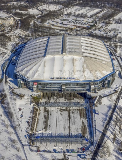 Aerial view, Schalke Veltins-Arena with closed roof and extension area for grass, Rudi-Assauer-Platz, Erle, Gelsenkirchen, Ruhr area, North Rhine-Westphalia, Germany, Arena, Arena AufSchalke, Berger Feld, Bundesliga stadium, DE, Europe, FC Schalke 04, football pitch, football stadium, football club, aerial view, aerial photography, aerial photography, snow, sports, sports facilities, sports ground, sports venue, stadium, overview, bird's eye view, winter, birds-eyes view, closed roof of the arena, overview