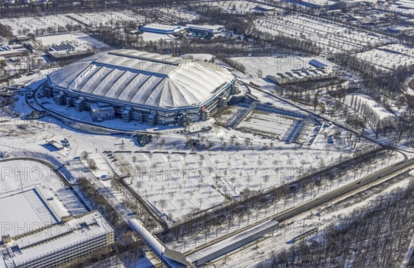 Aerial view, Schalke Veltins-Arena with closed roof and extension area for grass, Rudi-Assauer-Platz, Beckhausen, Gelsenkirchen, Ruhr area, North Rhine-Westphalia, Germany, Arena, Arena AufSchalke, Berger Feld, Bundesliga stadium, DE, Europe, FC Schalke 04, football pitch, football stadium, football club, aerial view, aerial photography, aerial photography, snow, sports, sports facilities, sports ground, sports venue, stadium, overview, bird's eye view, winter, birds-eyes view, closed roof of the arena, overview