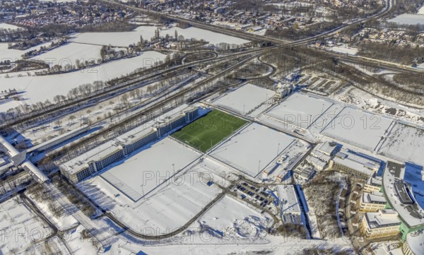 Aerial view, training ground in the snow at the Veltins-Arena, new car park Stan-Libuda-Weg, Erle, Gelsenkirchen, Ruhr area, North Rhine-Westphalia, Germany, Berger Feld, DE, Europe, FC Schalke 04, distant view, football pitch, football stadium, football club, hotel business, aerial view, aerial photography, aerial photography, snow, sports, sports facilities, sports field, sports facility, training grounds, overview, bird's eye view, winter, birds-eyes view, overview