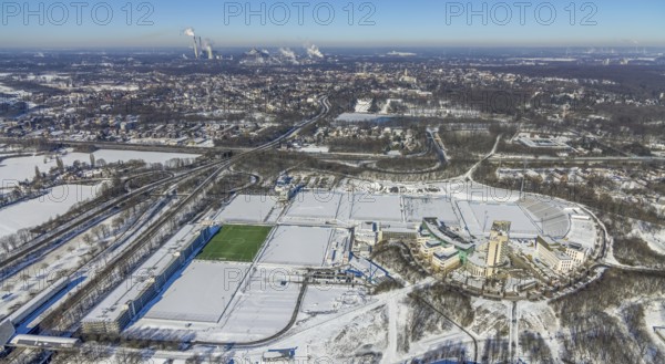 Aerial view, training ground and park stadium in the snow at the Veltins-Arena, Hotel Courtyard by Marriott Gelsenkirchen, construction site at the hotel, Parkallee, Stadionring, Erle, Gelsenkirchen, Ruhr area, North Rhine-Westphalia, Germany, Berger Feld, DE, Europe, FC Schalke 04, distant view, football pitch, football stadium, football club, gastronomy, hotel, hotel facilities, hotel business, aerial view, aerial photography, aerial photography, snow, sports, sports facilities, sports field, sports facility, training grounds, overview, accommodation, bird's eye view, winter, birds-eyes view, overview