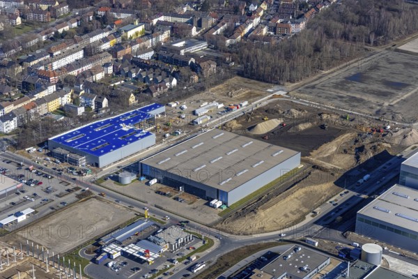 Aerial view, construction site commercial area and service location Europastraße, ProReServ - Professional Retail Service, former blast furnace location Schalker Verein, Gelsenkirchen-Bulmke-Hüllen, Gelsenkirchen, Ruhr area, North Rhine-Westphalia, Germany, construction work, construction area, construction site, building plots, construction measure, construction project, construction site, DE, Europe, commercial enterprises, commercial area, commercial park, commercial location, commercial use, industrial area, industrial building, industrial location, logistics, logistics service, logistics service provider, logistics provider, logistics centre, aerial view, aerial photography, aerial photography, new building, overview, bird's-eye view, overview
