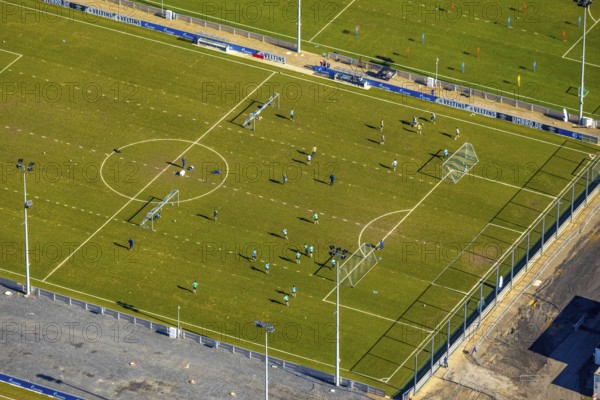 Aerial view, football players and training grounds at the Schalke Veltins-Arena, Berger Feld, Erle, Gelsenkirchen, Ruhr area, North Rhine-Westphalia, Germany, Arena, DE, Europe, football field, football pitch, football player, football stadium, football club, aerial view, aerial photography, aerial photography, sports, sports facilities, sports field, sports facility, stadium, training grounds, overview, bird's eye view, birds-eyes view, overview