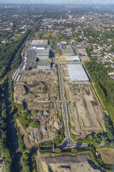 Aerial view, construction site commercial area and industrial park Schalker Verein on Europastrasse with Wheels Logistic, bilstein group logistics centre, ProReServ, new construction DFI, WDP_VIB logistics hall in the Bulmke-Hüllen district in Gelsenkirchen, Ruhr area, North Rhine-Westphalia, Germany, construction work, construction, construction area, building site, building plots, construction measure, construction project, construction site, DE, Europe, Gelsenkirchen, commercial enterprises, commercial area, commercial park, commercial location, commercial use, industrial area, industrial building, industrial location, logistics, logistics service, logistics service provider, logistics provider, logistics centre, aerial photograph, aerial photography, aerial photography, new building, overview, bird's-eye view, birds-eyes view, former blast furnace location Schalker Verein, overview