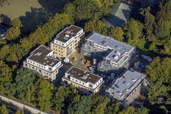 Aerial view, construction site Breddestraße for new construction of residential buildings in the district Buer in Gelsenkirchen, Ruhr area, North Rhine-Westphalia, Germany, construction work, construction area, building site, building plots, construction measure, construction project, construction site, DE, Europe, Gelsenkirchen, property tax, real estate, aerial view, aerial photography, aerial photography, new construction, overview, bird's eye view, residential complex, residential units, living and living, residential area, residential buildings, quality of living, birds-eyes view, overview