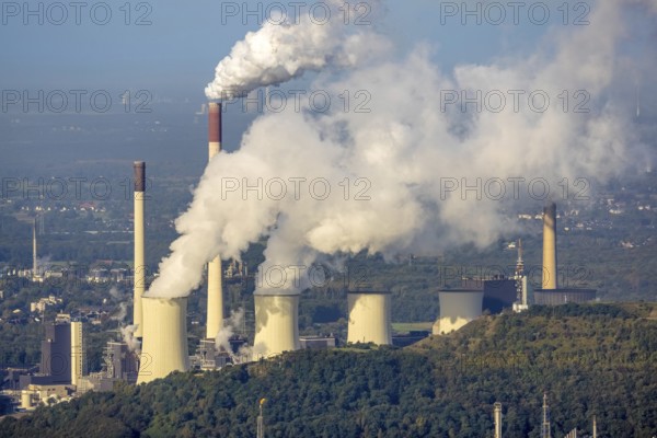 Aerial view, Smoking chimneys and cooling towers at the Uniper power plant Scholven in the district Scholven in Gelsenkirchen, Ruhr area, North Rhine-Westphalia, Germany, DE, Europe, Gelsenkirchen, commercial enterprises, commercial area, commercial site, commercial use, industrial area, industrial site, power plant, aerial view, aerial photography, aerial photography, overview, bird's-eye view, overview