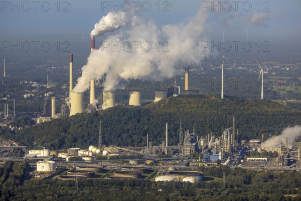Aerial view, Smoking chimneys and cooling towers at Uniper power plant Scholven and Ruhr oil refinery Scholven in the district Scholven in Gelsenkirchen, Ruhr area, North Rhine-Westphalia, Germany, DE, Europe, Gelsenkirchen, commercial enterprises, commercial area, commercial site, commercial use, industrial area, industrial site, power plant, aerial view, aerial photography, aerial photography, overview, bird's-eye view, bird's-eye view, overview, oil refinery