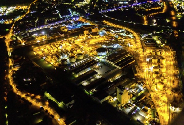 Aerial view, city harbour tank farm, Schalke-Nord, Gelsenkirchen, Ruhr area, North Rhine-Westphalia, Germany, DE, twilight photography, Europe, commercial enterprises, commercial area, commercial park, commercial location, commercial use, industrial area, industrial building, industrial location, light pollution, aerial photograph, aerial photography, aerial photography, night, night photography, night flight, overview, bird's eye view, illuminated streets, birds-eyes view, nightflight, overview
