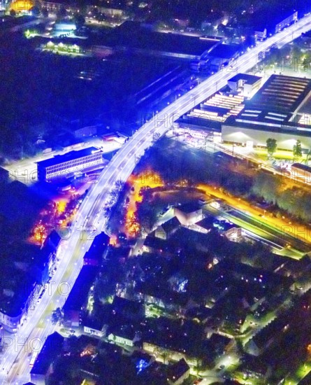 Aerial view, lighting in Schalke blue, Schalke 04, Kurt-Schumacher Straße with thyssenkrupp Electrical Steel GmbH, Schalke, Gelsenkirchen, Ruhr area, North Rhine-Westphalia, Germany, DE, twilight photography, Europe, commercial enterprises, commercial area, commercial park, commercial location, commercial use, industrial area, industrial site, light pollution, aerial view, aerial photography, aerial photography, night, night photography, night flight, overview, bird's-eye view, illuminated streets, birds-eyes view, blue band, blue light, artificial light, nightflight, overview