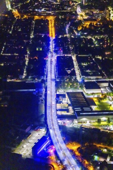 Aerial view, lighting in Schalke blue, Schalke 04, Kurt-Schumacher Straße with thyssenkrupp Electrical Steel GmbH, Schalke, Gelsenkirchen, Ruhr area, North Rhine-Westphalia, Germany, DE, twilight photography, Europe, commercial enterprises, commercial area, commercial park, commercial location, commercial use, industrial area, industrial site, light pollution, aerial view, aerial photography, aerial photography, night, night photography, night flight, overview, bird's-eye view, illuminated streets, birds-eyes view, blue band, blue light, artificial light, nightflight, overview
