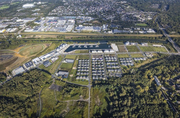 Aerial view, Graf Bismarck harbour with Stölting Marina and terraced house housing estate as well as construction site harbour quarter at the Rhine-Herne-Canal and river Emscher in the district Bismarck in Gelsenkirchen, Ruhr area, North Rhine-Westphalia, Germany, construction area, building site, building plots, building project, construction site, DE, Europe, Gelsenkirchen, property tax, harbour, harbour area, real estate, marina, aerial view, aerial photography, aerial photography, overview, bird's-eye view, residential complex, residential area, residential buildings, residential quality, residential quarter, housing estate, marina, birds-eyes view, overview