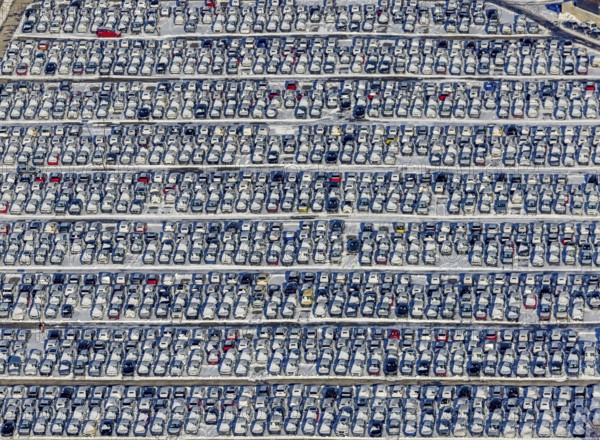 Aerial photo, CAT Automobillogistik Essen, Essen-Altenessen, Essen, Ruhr area, North Rhine-Westphalia, Germany, DE, Europe, shapes and colours, storage, logistics, logistics service, logistics service provider, logistics provider, aerial photo, aerial photography, aerial photography, snow, transport, transport service, overview, bird's eye view, winter, birds-eyes view, overview, car dump in winter, rows of cars, different coloured cars, car lot