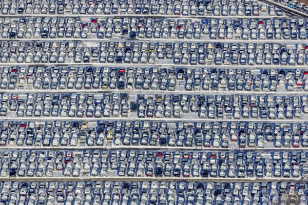 Aerial photo, CAT Automobillogistik Essen, Essen-Altenessen, Essen, Ruhr area, North Rhine-Westphalia, Germany, DE, Europe, shapes and colours, storage, logistics, logistics service, logistics service provider, logistics provider, aerial photo, aerial photography, aerial photography, snow, transport, transport service, overview, bird's eye view, winter, birds-eyes view, overview, car dump in winter, rows of cars, different coloured cars, car lot