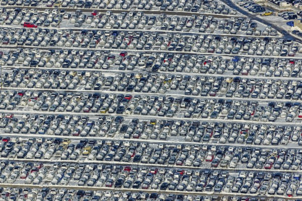 Aerial photo, CAT Automobillogistik Essen, Essen-Altenessen, Essen, Ruhr area, North Rhine-Westphalia, Germany, DE, Europe, shapes and colours, storage, logistics, logistics service, logistics service provider, logistics provider, aerial photo, aerial photography, aerial photography, snow, transport, transport service, overview, bird's eye view, winter, birds-eyes view, overview, car dump in winter, rows of cars, different coloured cars, car lot