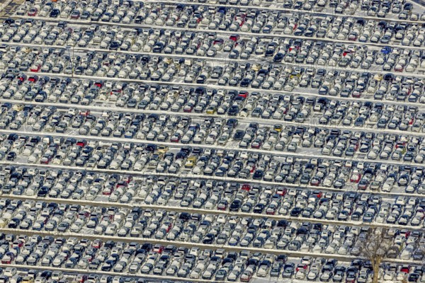 Aerial photo, CAT Automobillogistik Essen, Essen-Altenessen, Essen, Ruhr area, North Rhine-Westphalia, Germany, DE, Europe, shapes and colours, storage, logistics, logistics service, logistics service provider, logistics provider, aerial photo, aerial photography, aerial photography, snow, transport, transport service, overview, bird's eye view, winter, birds-eyes view, overview, car dump in winter, rows of cars, different coloured cars, car lot
