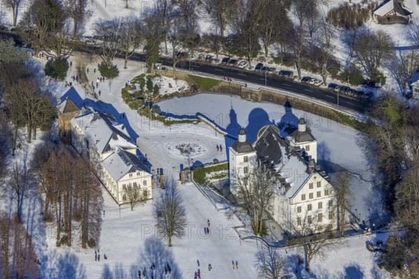 Aerial view, Borbeck Castle in winter landscape, Borbeck-Mitte, Essen, Ruhr area, North Rhine-Westphalia, Germany, DE, Europe, manor house, aerial view, aerial photography, aerial photography, park, castle, castle grounds, Schlossstraße, snow, overview, bird's-eye view, moated castle, winter, birds-eyes view, overview