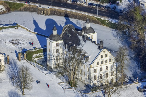 Aerial view, Borbeck Castle in winter landscape, Borbeck-Mitte, Essen, Ruhr area, North Rhine-Westphalia, Germany, DE, Europe, manor house, aerial view, aerial photography, aerial photography, park, castle, castle grounds, Schlossstraße, snow, overview, bird's-eye view, moated castle, winter, birds-eyes view, overview
