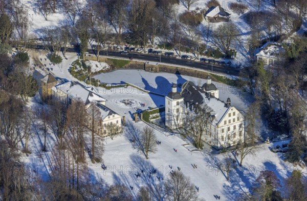 Aerial view, Borbeck Castle in winter landscape, Borbeck-Mitte, Essen, Ruhr area, North Rhine-Westphalia, Germany, DE, Europe, manor house, aerial view, aerial photography, aerial photography, park, castle, castle grounds, Schlossstraße, snow, overview, bird's-eye view, moated castle, winter, birds-eyes view, overview