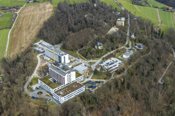 Aerial view, Ruhrlandklinik with construction site, Essen-Heidhausen, Essen, Ruhr area, North Rhine-Westphalia, Germany, construction work, construction area, construction site, building plots, construction project, construction site, DE, Europe, specialist clinic, healthcare, hospital, clinic, clinic centre, hospital, aerial view, aerial photography, aerial photography, medical facility, medical aid, new building, emergency service, Tüschener Weg, overview, bird's eye view, birds-eyes view, overview, medical care