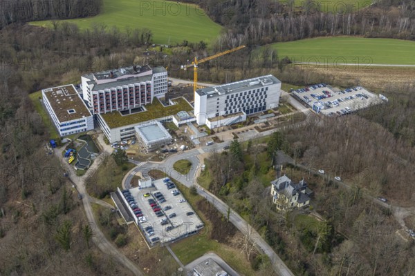 Aerial view, Ruhrlandklinik with construction site, Essen-Heidhausen, Essen, Ruhr area, North Rhine-Westphalia, Germany, construction work, construction area, construction site, building plots, construction project, construction site, DE, Europe, specialist clinic, healthcare, hospital, clinic, clinic centre, hospital, aerial view, aerial photography, aerial photography, medical facility, medical aid, new building, emergency service, Tüschener Weg, overview, bird's eye view, birds-eyes view, overview, medical care