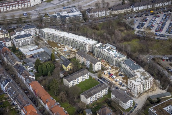 Aerial view, construction site new building RüBogen, Gummertstraße residential development, Essen-Rüttenscheid, Essen, Ruhr area, North Rhine-Westphalia, Germany, construction work, construction area, construction site, building plots, construction crane, construction project, construction site, DE, Europe, property tax, Herthastraße, real estate, capacity requirement, aerial view, aerial photography, aerial photography, new building, overview, bird's eye view, residential complex, Wohnbau eG, residential area, residential buildings, birds-eyes view, overview