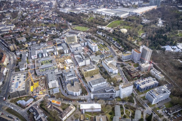 Aerial view, University Hospital Essen, construction site at the building Institute Group 1 (IG1), Mensa Campus Klinikum, Essen-Holsterhausen, Essen, Ruhr area, North Rhine-Westphalia, Germany, construction work, construction area, construction site, building plots, construction measure, construction project, construction site, DE, Europe, LLZ, Teaching and Learning Centre of the Medical Faculty of the University of Duisburg-Essen, aerial view, aerial photography, aerial photography, new building, overview, university hospital, bird's eye view, birds-eyes view, overview
