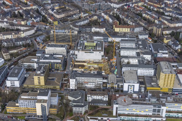 Aerial view, University Hospital Essen, construction site at the building Institute Group 1 (IG1), Mensa Campus Klinikum, Essen-Holsterhausen, Essen, Ruhr area, North Rhine-Westphalia, Germany, construction work, construction area, construction site, building plots, construction measure, construction project, construction site, DE, Europe, LLZ, Teaching and Learning Centre of the Medical Faculty of the University of Duisburg-Essen, aerial view, aerial photography, aerial photography, new building, overview, university hospital, bird's eye view, birds-eyes view, overview