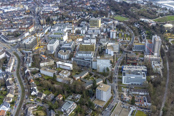 Aerial view, University Hospital Essen, construction site at the building Institute Group 1 (IG1), Mensa Campus Klinikum, Essen-Holsterhausen, Essen, Ruhr area, North Rhine-Westphalia, Germany, construction work, construction area, construction site, building plots, construction measure, construction project, construction site, DE, Europe, LLZ, Teaching and Learning Centre of the Medical Faculty of the University of Duisburg-Essen, aerial view, aerial photography, aerial photography, new building, overview, university hospital, bird's eye view, birds-eyes view, overview