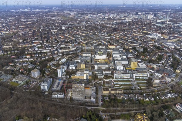 Aerial view, University Hospital Essen, construction site at the building Institute Group 1 (IG1), Mensa Campus Klinikum, Essen-Holsterhausen, Essen, Ruhr area, North Rhine-Westphalia, Germany, construction work, construction area, construction site, building plots, construction measure, construction project, construction site, DE, Europe, LLZ, Teaching and Learning Centre of the Medical Faculty of the University of Duisburg-Essen, aerial view, aerial photography, aerial photography, new building, overview, university hospital, bird's eye view, birds-eyes view, overview