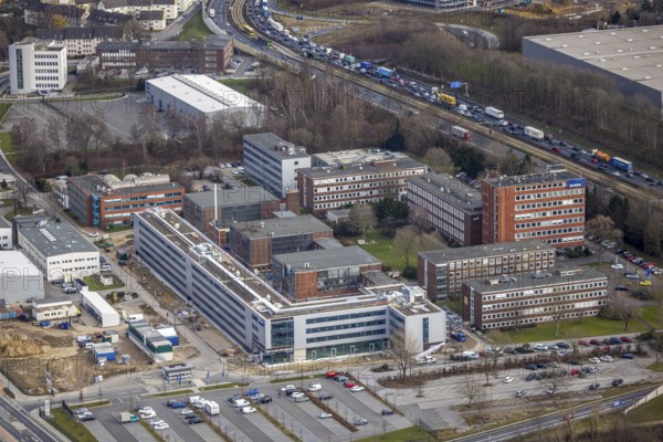 Aerial view, Technology Park Essen TPE on the A40 motorway, TÜV Informationstechnik GmbH group of companies TÜV NORD, Am Technologiepark, Essen-Kray, Essen, Ruhr area, North Rhine-Westphalia, Germany, A40 motorway, DE, development, Europe, commercial enterprises, commercial area, commercial park, commercial location, commercial use, industrial location, capacity requirements, aerial view, aerial photography, aerial photography, new building, technology, TÜV, overview, bird's-eye view, bird's-eye view, overview