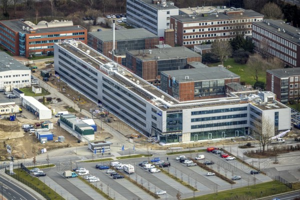 Aerial view, Technology Park Essen TPE on the A40 motorway, TÜV Informationstechnik GmbH group of companies TÜV NORD, Am Technologiepark, Essen-Kray, Essen, Ruhr area, North Rhine-Westphalia, Germany, A40 motorway, DE, development, Europe, commercial enterprises, commercial area, commercial park, commercial location, commercial use, industrial location, capacity requirements, aerial view, aerial photography, aerial photography, new building, technology, TÜV, overview, bird's-eye view, bird's-eye view, overview