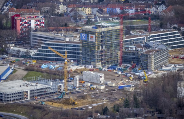 Aerial view, new construction ALDI-Nord Campus, Eckenbergstraße / Am Luftschacht, Essen-Kray, Essen, Ruhr area, North Rhine-Westphalia, Germany, construction work, construction area, building site, building plots, construction crane, construction measure, construction project, construction site, Buderus branch Essen - Bosch Thermotechnik, DE, development, Europe, commercial enterprises, commercial area, commercial park, commercial site, commercial use, industrial site, capacity requirement, aerial view, aerial photography, aerial photography, new construction, overview, bird's-eye view, overview