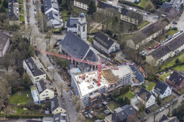 Aerial view, conversion of St. Mary's Church into flats and new construction for flats, Essen-Steele, Essen, Ruhr area, North Rhine-Westphalia, Germany, construction work, construction, construction area, building site, building plots, construction crane, construction project, construction site, Buschstraße, DE, Europe, property tax, real estate, church, aerial view, aerial photography, aerial photography, new construction, overview, bird's eye view, living and living, residential buildings, quality of living, residential neighbourhood, living space, birds-eyes view, overview