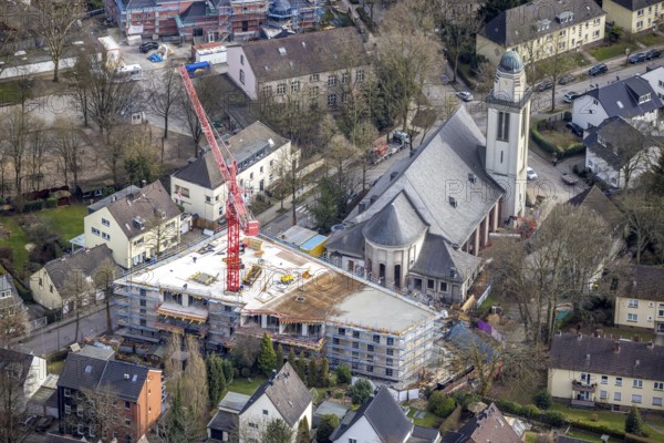 Aerial view, conversion of St. Mary's Church into flats and new construction for flats, Essen-Steele, Essen, Ruhr area, North Rhine-Westphalia, Germany, construction work, construction, construction area, building site, building plots, construction crane, construction project, construction site, Buschstraße, DE, Europe, property tax, real estate, church, aerial view, aerial photography, aerial photography, new construction, overview, bird's eye view, living and living, residential buildings, quality of living, residential neighbourhood, living space, birds-eyes view, overview