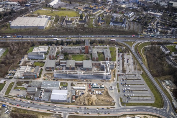Aerial view, Technology Park Essen TPE on the A40 motorway, TÜV Informationstechnik GmbH group of companies TÜV NORD, Am Technologiepark, Essen-Kray, Essen, Ruhr area, North Rhine-Westphalia, Germany, A40 motorway, DE, development, Europe, commercial enterprises, commercial area, commercial park, commercial location, commercial use, industrial location, capacity requirements, aerial view, aerial photography, aerial photography, new building, technology, TÜV, overview, bird's-eye view, bird's-eye view, overview