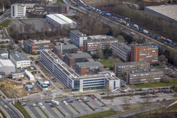 Aerial view, Technology Park Essen TPE on the A40 motorway, TÜV Informationstechnik GmbH group of companies TÜV NORD, Am Technologiepark, Essen-Kray, Essen, Ruhr area, North Rhine-Westphalia, Germany, A40 motorway, DE, development, Europe, commercial enterprises, commercial area, commercial park, commercial location, commercial use, industrial location, capacity requirements, aerial view, aerial photography, aerial photography, new building, technology, TÜV, overview, bird's-eye view, bird's-eye view, overview