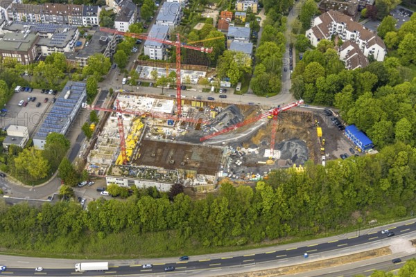 Aerial view, construction site multi-family houses Manfredstraße at the motorway A52, Essen-Rüttenscheid, Essen, Ruhr area, North Rhine-Westphalia, Germany, construction work, construction area, construction site, building plots, construction project, construction site, DE, Europe, fire station, fire brigade, aerial view, aerial photography, aerial photography, multi-family houses, apartment buildings, new construction, photovoltaic, photovoltaic system, solar, solar system, solar energy, solar energy, overview, bird's eye view, birds-eyes view, overview