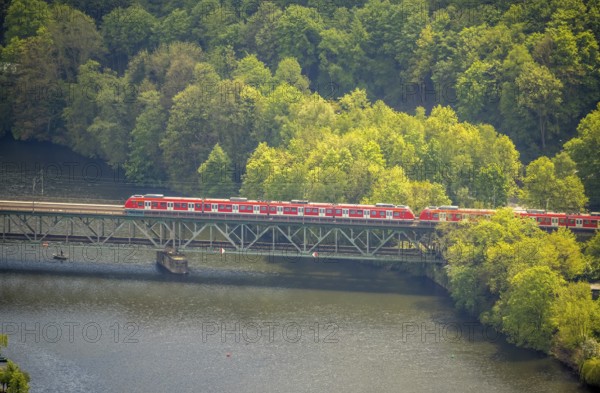 Aerial view, river Ruhr and suburban railway on the railway bridge Kettwig, Kettwig, Essen, Ruhr area, North Rhine-Westphalia, Germany, bridge, DE, Europe, river Ruhr, aerial view, aerial photography, aerial photography, suburban railway, overview, bird's eye view, train, birds-eyes view, overview