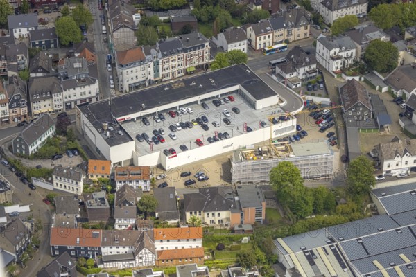 Aerial view, construction site at Rewe shopping centre, parking deck, Kettwig, Essen, Ruhr area, North Rhine-Westphalia, Germany, construction work, construction area, construction site, building plots, construction project, construction site, DE, shopping markets, shopping centre, Europe, aerial view, aerial photography, aerial photography, local supply centre, new building, parking spaces, Rewe supermarket, supermarket, overview, bird's-eye view, overview